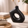 Black Sculptural Decorative Vase with Central Opening