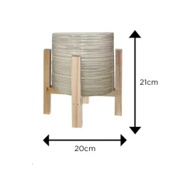 Cream textured ceramic planter on wooden stand (21 x 20 cm)