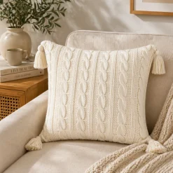 LAURENT TAYLOR - Cable crochet with tassles knit cushion